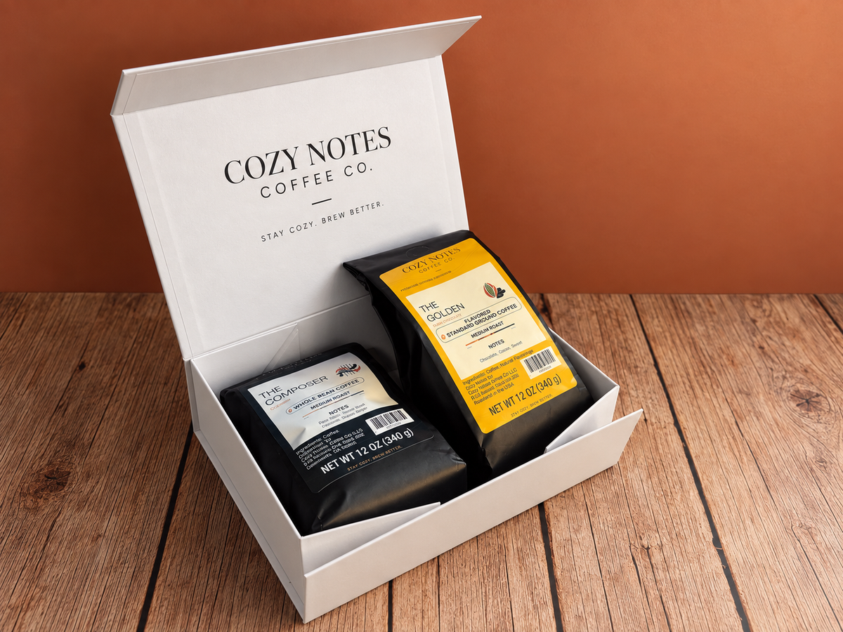 The Composer and The Golden coffee bags in a white Cozy Notes box.