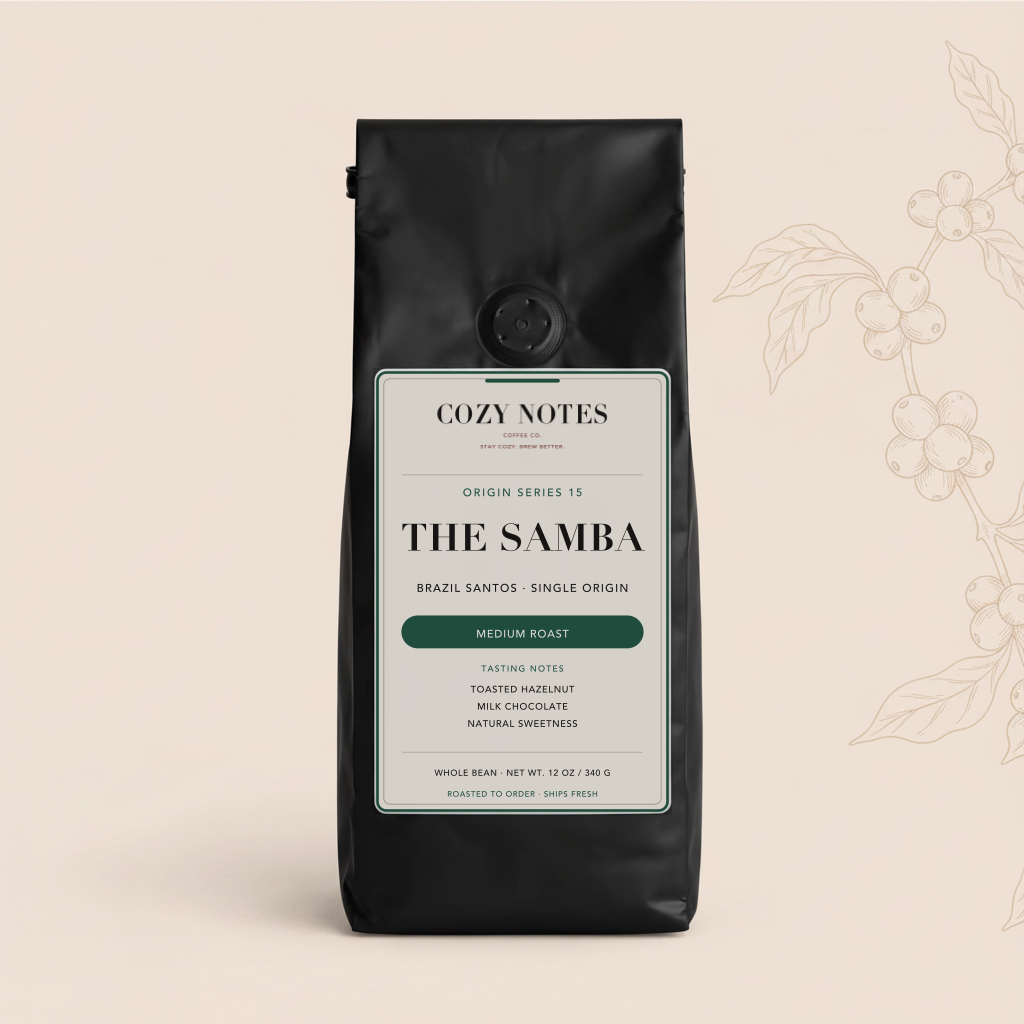A black coffee bag labeled Cozy Notes The Samba Medium Roast, set against a warm beige background with a delicate coffee plant illustration on the right.
