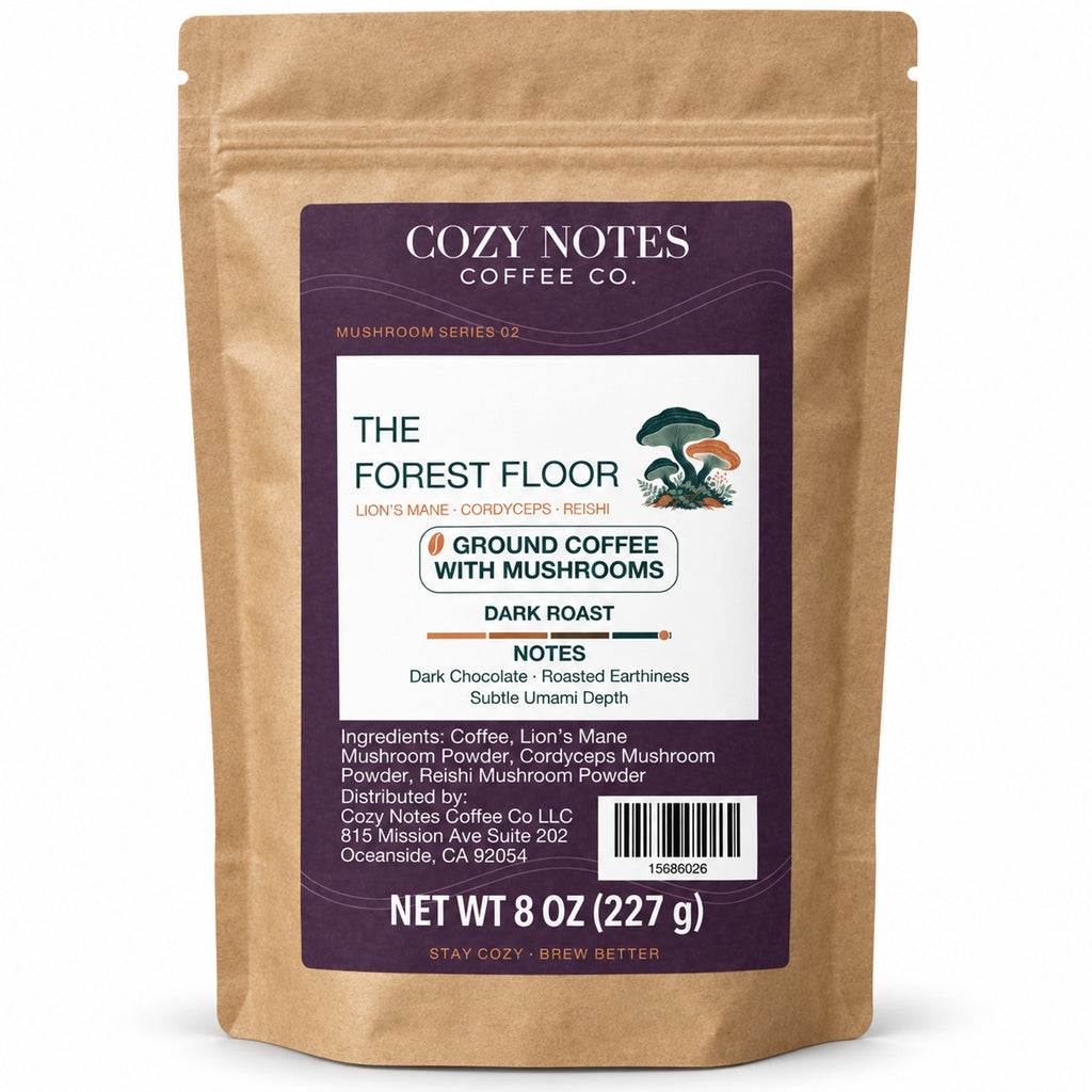 Cozy Notes The Forest Floor dark roast ground coffee with mushrooms, 8 oz (227 g), in a kraft pouch — main product image.