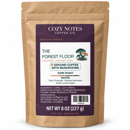 Cozy Notes The Forest Floor dark roast ground coffee with mushrooms, 8 oz (227 g), in a kraft pouch — main product image.