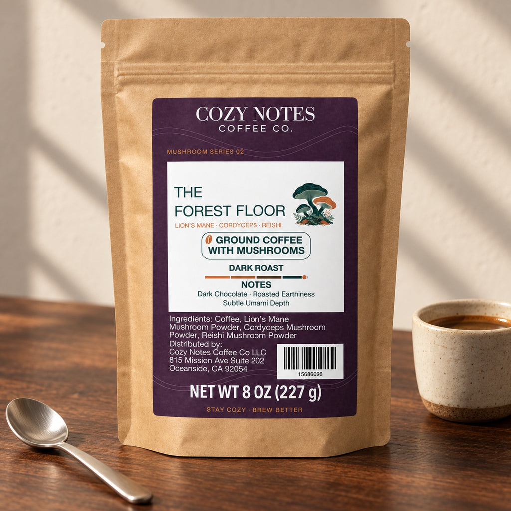 Cozy Notes The Forest Floor dark roast ground coffee with mushrooms, 8 oz (227 g), in a kraft pouch — editorial product image.