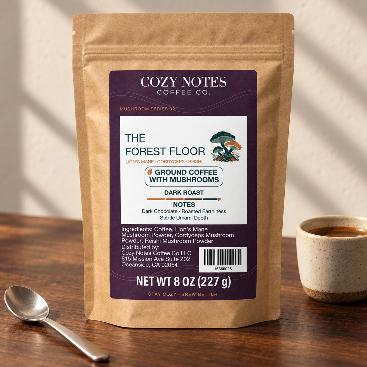 Cozy Notes The Forest Floor dark roast ground coffee with mushrooms, 8 oz (227 g), in a kraft pouch — editorial product image.