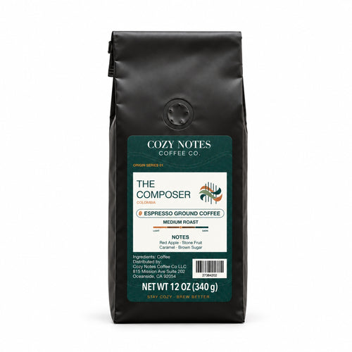 The Composer Colombian medium roast coffee, espresso grind, 12 oz black bag with the new Cozy Notes label, front view.