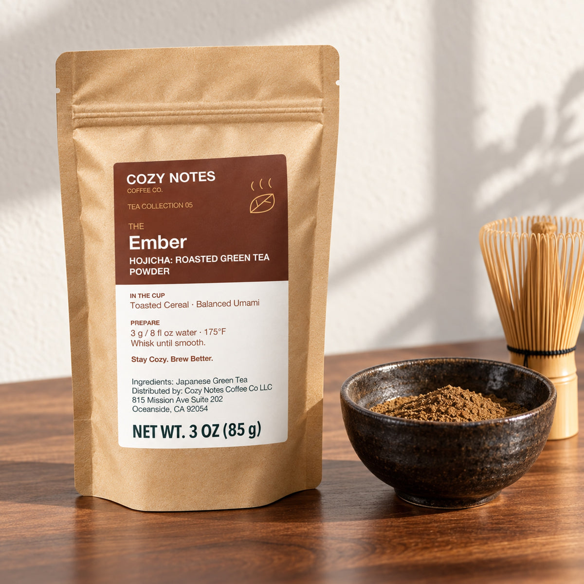 The Ember hojicha roasted green tea powder, 3 oz — premium tea serving scene with the updated Cozy Notes label.