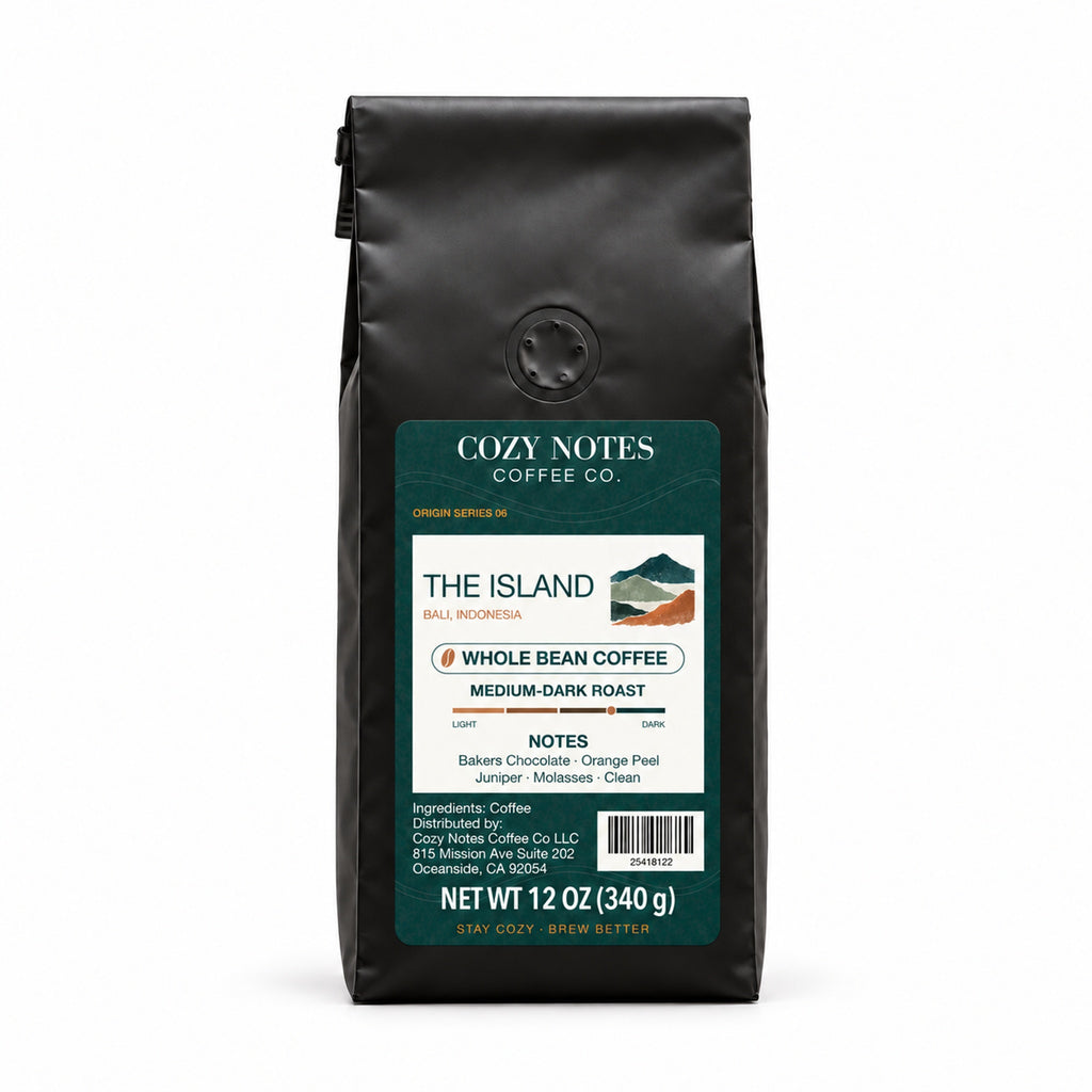 The Island Bali medium-dark roast coffee, whole bean, 12 oz — main view with Cozy Notes mountain label.