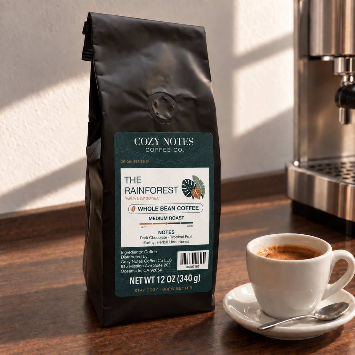The Rainforest Papua New Guinea medium roast whole bean coffee, 12 oz — lifestyle photograph.