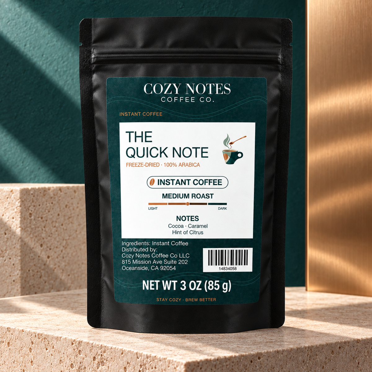 The Quick Note medium-roast instant coffee, current 3 oz pouch on limestone with teal and copper editorial styling.
