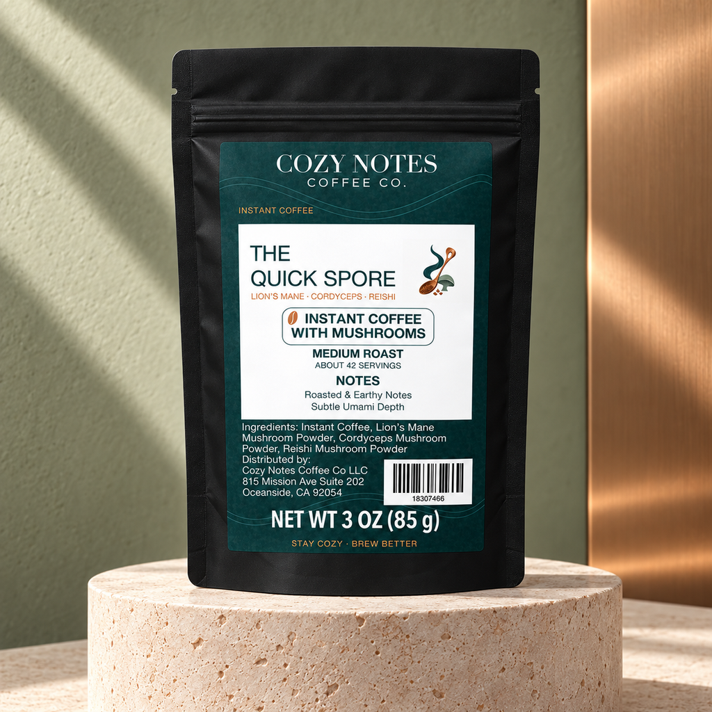 The Quick Spore medium-roast 3 oz instant mushroom coffee pouch, styled on limestone with sage and copper.